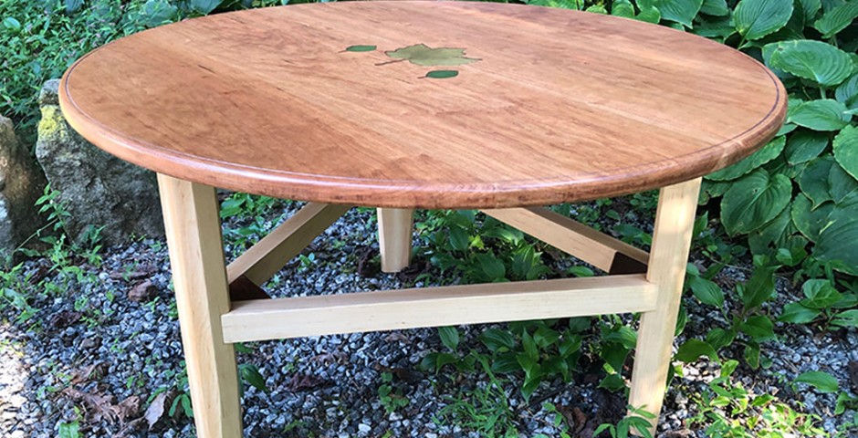 Round Cherry Coffee Table with Maple legs